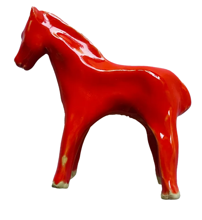 Petit cheval rouge en céramique